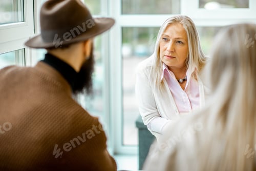Preview: Psychologist with young couple clients indoors