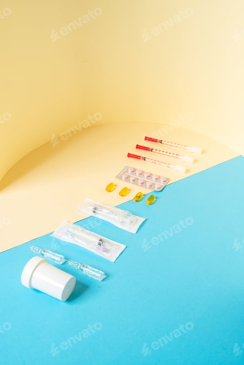 Preview: The set of a medical devices consisting of syringes, jar, tablets, ampoules standing in the studio
