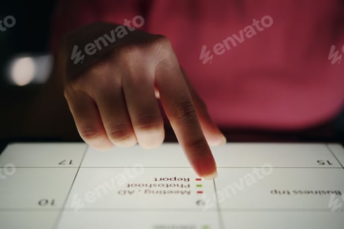 Preview: Hand Using Touchscreen Device for Business Presentation