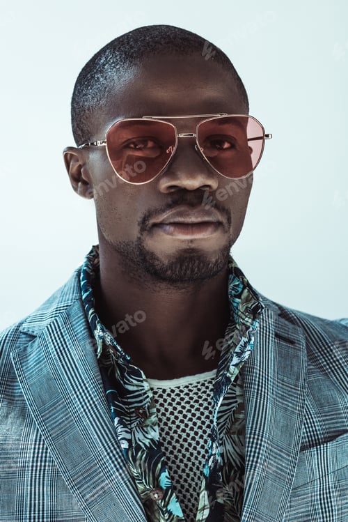 Preview: Portrait of handsome african american man in stylish clothes and sunglasses, looking at camera