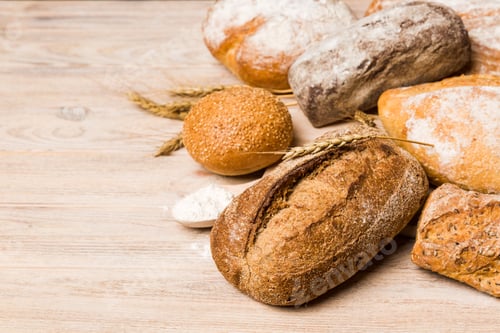 Preview: Homemade natural breads. Different kinds of fresh bread as background
