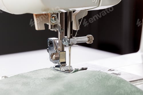 Preview: Sewing machine, stitching fabrics, needle in a round plan