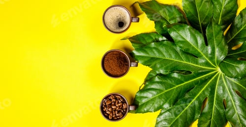 Preview: Coffee composition on yellow background, flat lay