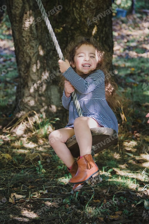 Preview: Girl on rope swing