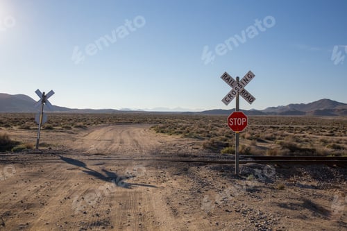 Preview: Red stop sign by the railroad in Trona Pinnacles, California