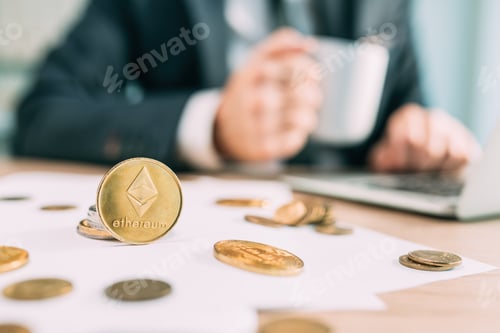 Preview: Ethereum cryptocurrency trader concept, closeup of coins and businessman working in background