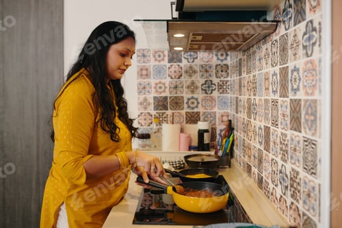 Preview: Woman Cooking Dinner For Her Family