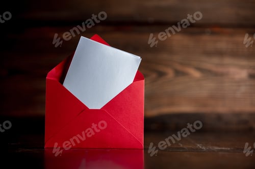 Preview: Red envelope to Santa Claus on wooden table