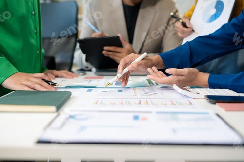 Preview: Marketing staff are analyzing the data to business planning at office.