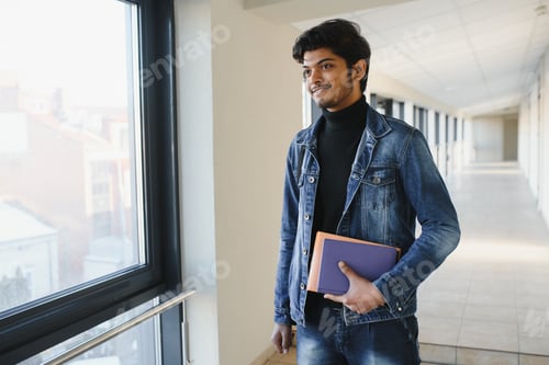 Preview: Happy indian male student at the university