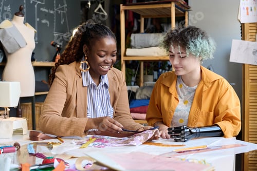 Preview: Girl with Prosthetic Arms Sewing Clothes with Social Worker