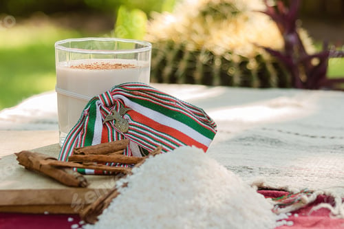 Preview: On the table in Mexico, cups of horchata and tableware await a joyful gathering.