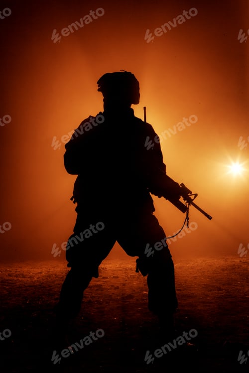 Preview: Soldiers silhouette on background of fire explosion