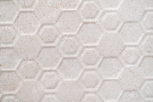 Preview: Background image of hexagonal clay tiles. White tiles texture with elements. High quality