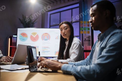 Preview: Multiracial company workers using technology at office