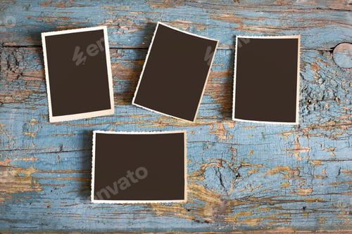Preview: Set of old photos on a blue background, top view