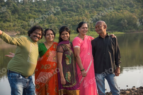 Preview: Happy Indian family having fun at outdoar.