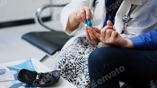 Preview: Elderly medic taking insulin level test