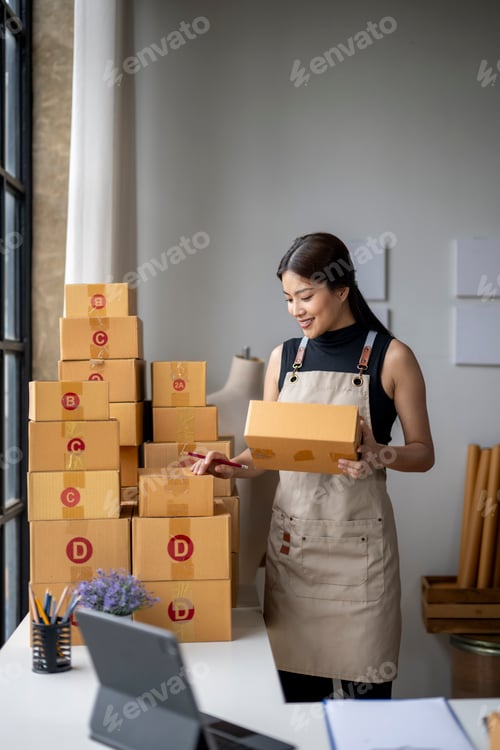 Preview: A woman is standing in front of a stack of boxes