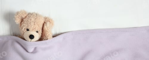 Preview: Headache, insomnia. Cute teddy in bed, holding his head, banner, copy space