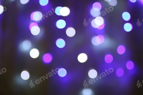 Preview: Abstract bokeh background. Blurred garland lights.