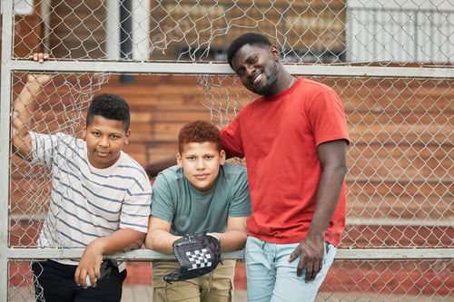 Preview: Father Posing With Sons At Stadium