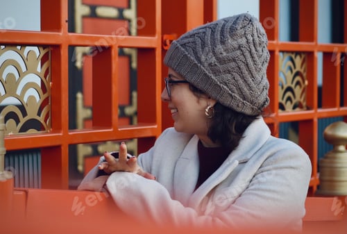 Preview: Girl smiling, looking the city