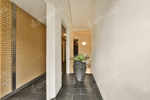 Preview: a hallway with a large vase with a plant