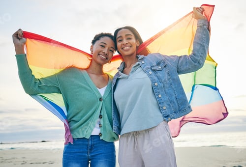 Preview: Woman, lesbian couple and pride flag on beach together in happiness for LGBTQ community or rights.