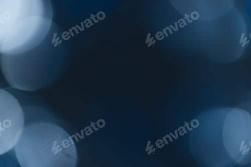 Preview: Blue bokeh lights with copy space on dark background