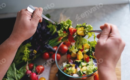 Preview: preparing healthy salad in kitchen