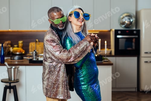 Preview: image of a multiethnic senior couple making party