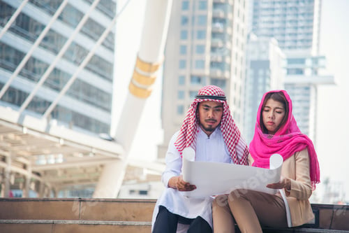 Preview: Arab team hold digital tablet uae union teamwork people. Digital marketing arab group