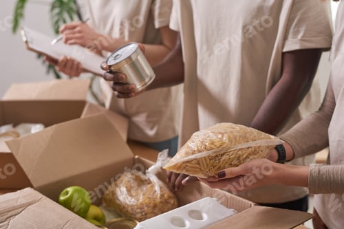 Preview: Volunteers Packing Food For Donation