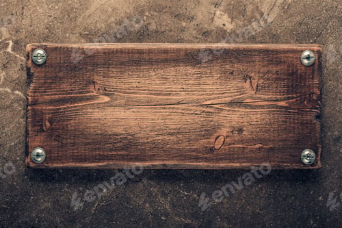 Preview: Wooden nameplate or sign board at wall background. Front view of name plate