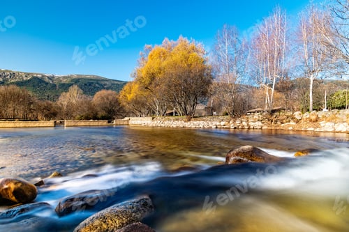 Preview: Water flowing over a small dam in Lozoya River near El Paular