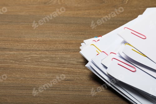 Preview: Concept of different office accessories - paper with clip