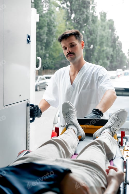 Preview: close up on the street in an ambulance a young patient with an injured neck and arm transporting the