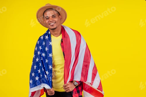 Preview: american man wrapped on flag looking at ca,era and snow-white smile