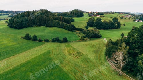 Preview: Aerial photograph of rural Bavarian landscape with farms, villages, green pastures, Southern Germany