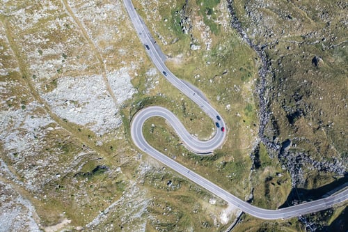 Preview: Top view of curvy road with cars