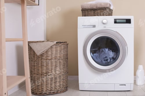 Preview: Laundry room interior with washing machine near wall