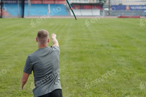 Preview: Throwing Javelin on Open Field in Stadium