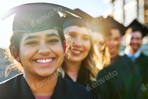 Preview: Portrait of a group of students standing in a line on graduation day