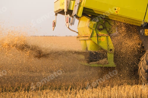 Preview: Harvester in wheat field