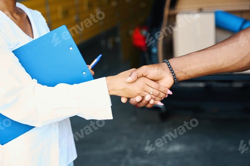 Preview: Female greets the client at the storage warehouse