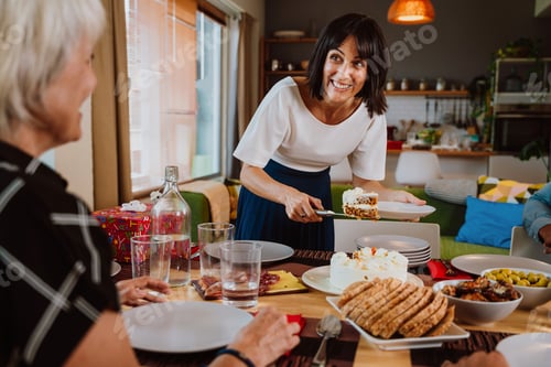 Preview: Family and friends reunion at home. Family celebrating birthday with joy and togetherness at home