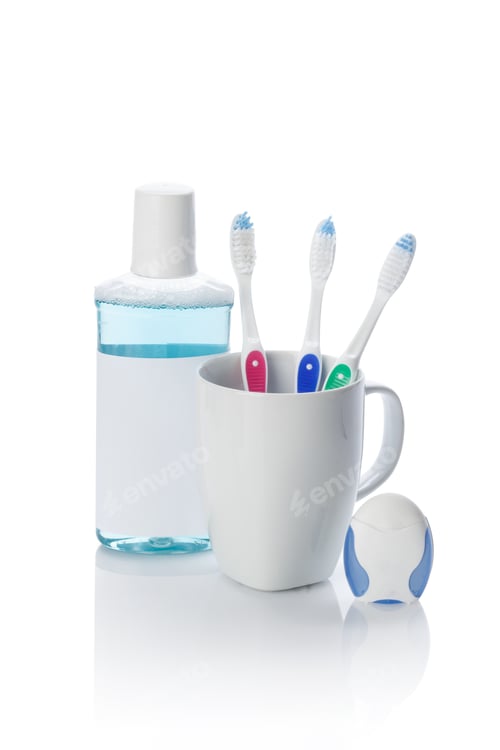Preview: Toothbrushes and mouthwash on a white background in a bathroom setting
