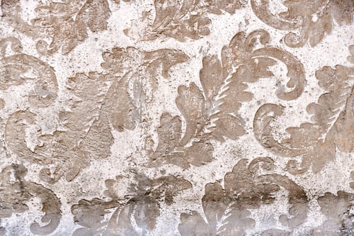 Preview: Floral design as background engraved in stone.