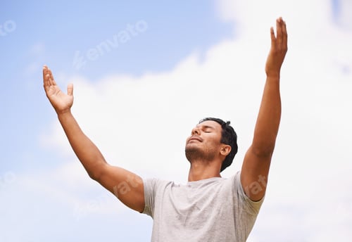 Preview: Embrace the day. Shot of a man with his arms outstretched to the sky.